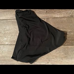 swim bottoms black, v front,plastic attached.